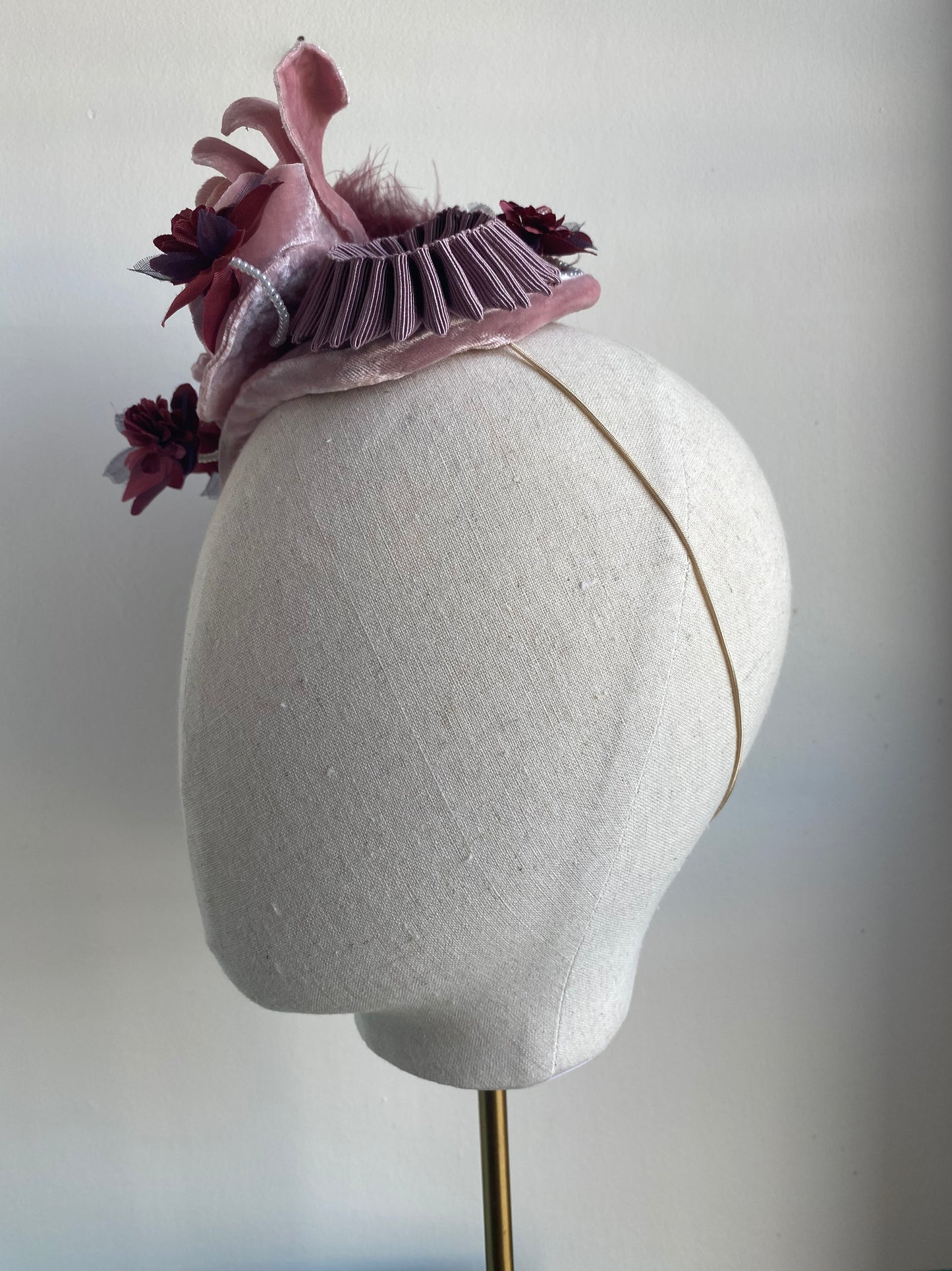 Pale pink and burgundy, floral and feather headpiece