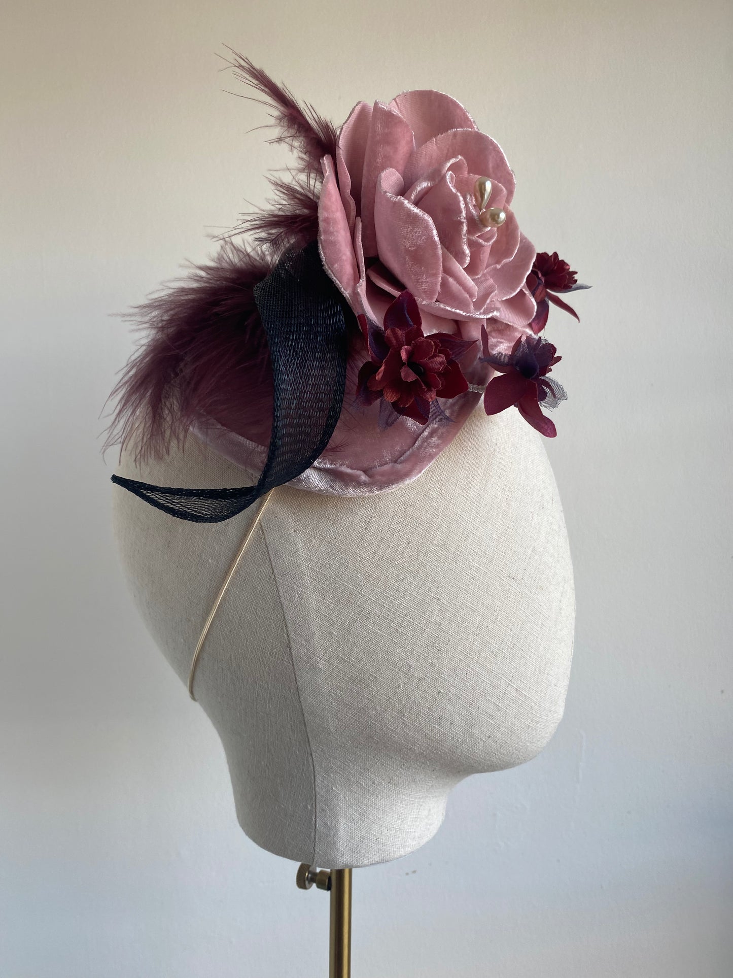 Pale pink and burgundy, floral and feather headpiece