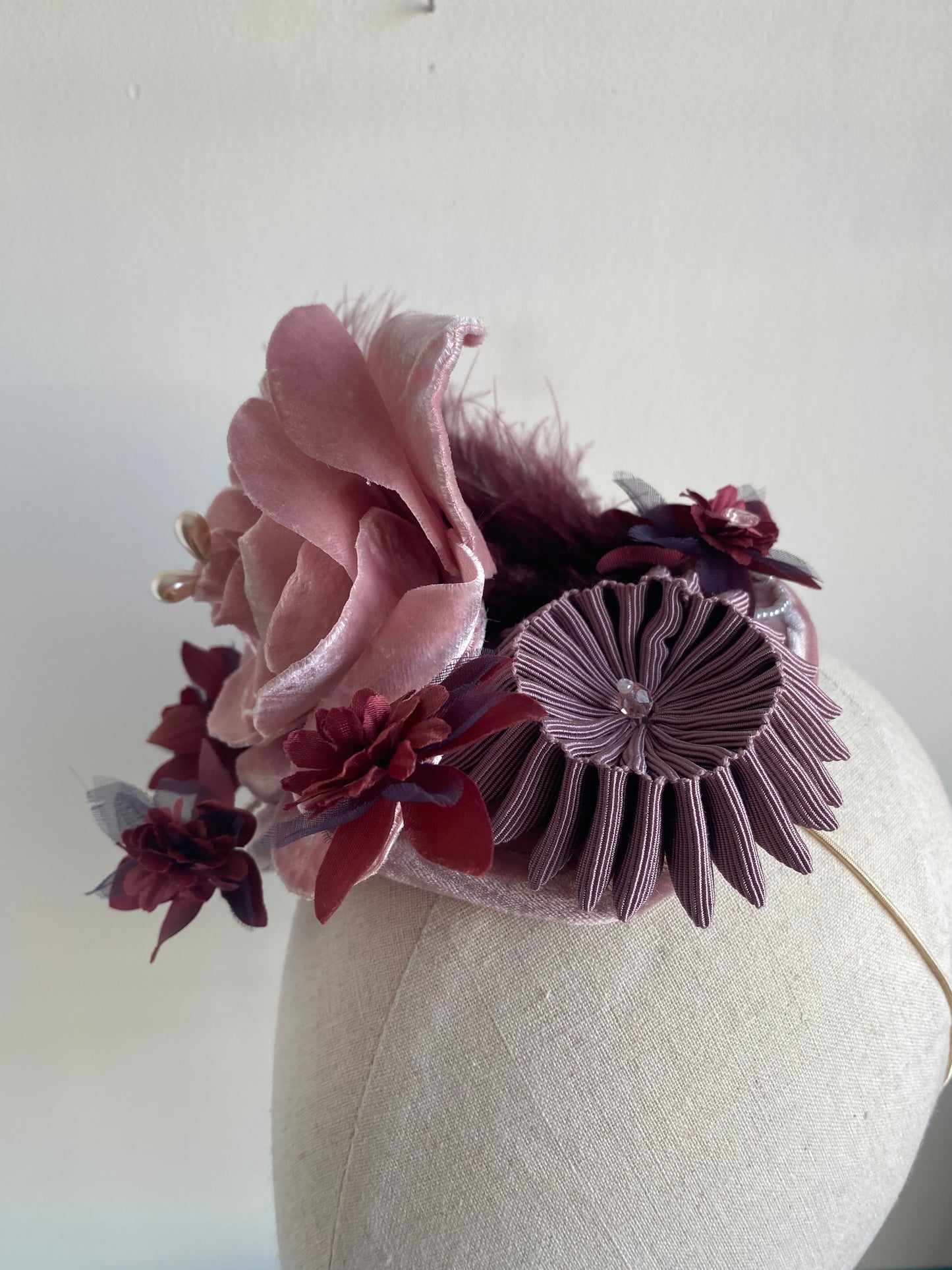 Pale pink and burgundy, floral and feather headpiece