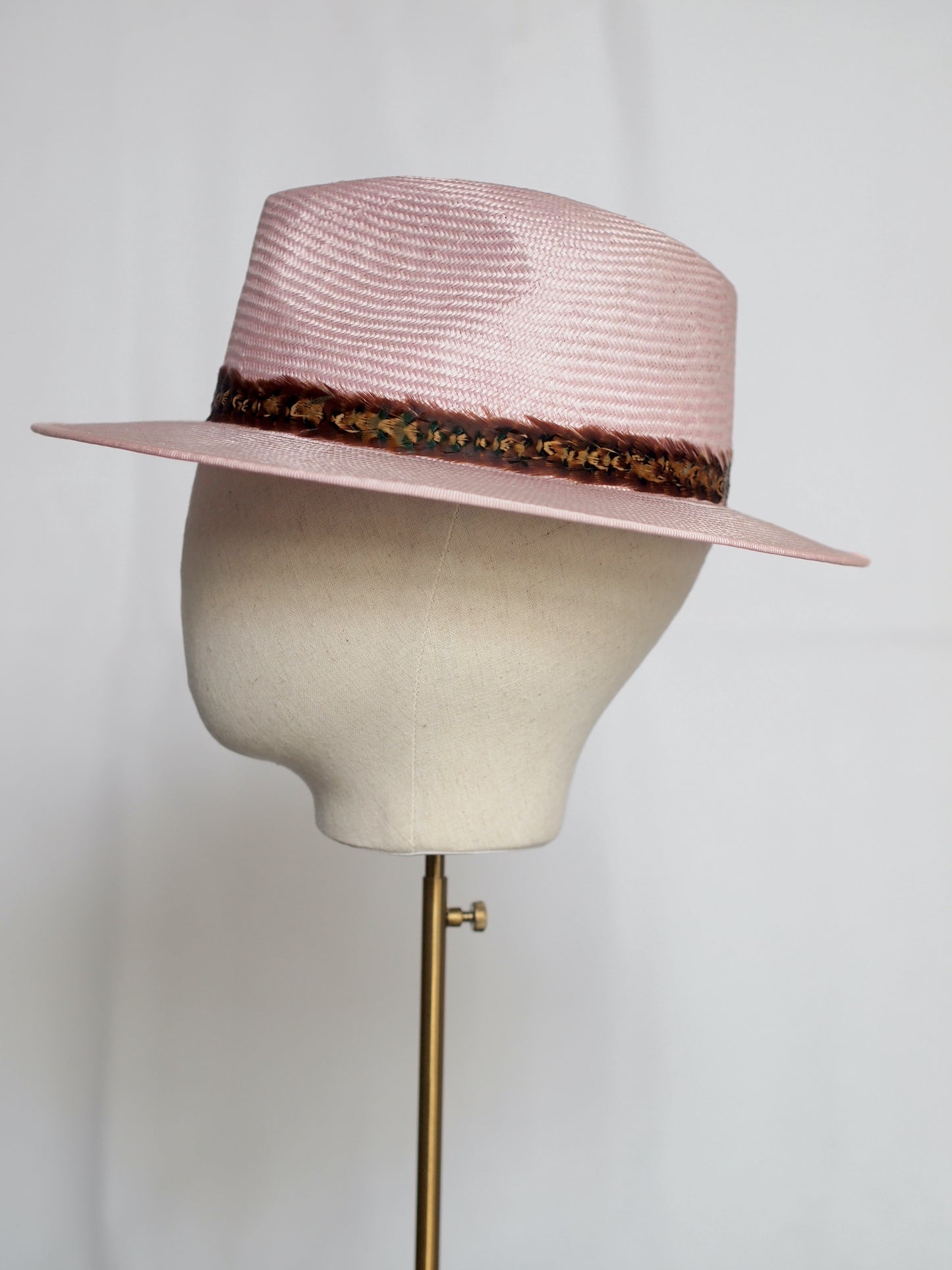 Pale pink straw fedora with two toned feather headband