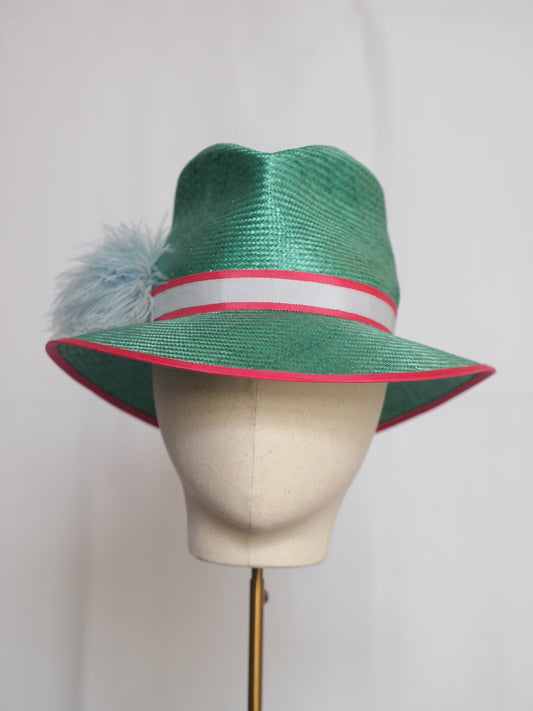 Green straw fedora with feather pom pom